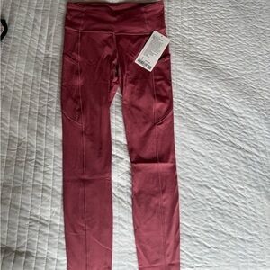 Lululemon Fast and Free High Rise Tight 25" Nulux Running
Leggings Pink